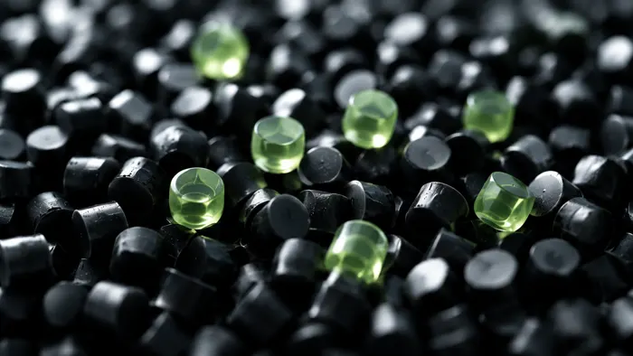 Recycled black elastomer granules with lime accent pellets
